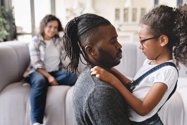 man with his daughter and ex-spouse